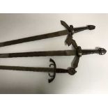 Three replica claymore swords