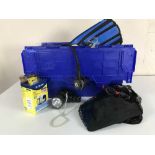 A box of scuba diving equipment including flippers, regulators, snorkels, torches,
