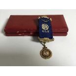 A 9ct gold and enamel Royal Order of Buffaloes medal, 6.