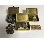 Two Princess Mary Christmas tins and another tin containing a quantity of military brass