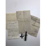 A military cross on suspension ribbon with various paperwork awarded to Captain A E Crowder,