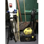 A Karcher pressure washer together with spirit levels, tool box,
