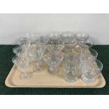 Two trays of assorted lead crystal drinking glasses