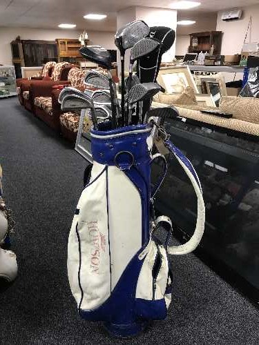 A Houwsen golf bag of Tour Classic irons,