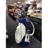 A Houwsen golf bag of Tour Classic irons,