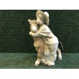 A Lladro figure - Boy with donkey