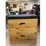 A pine storage chest in the form of a gymnast's vault