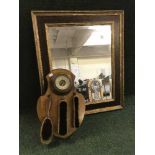 A contemporary framed mirror together with an oak barometer brush set