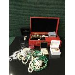 A basket containing jewellery box, dress rings, beads,