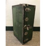 A metal bound travelling trunk