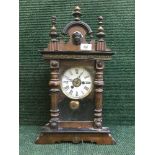 A late nineteenth century continental mahogany mantle clock