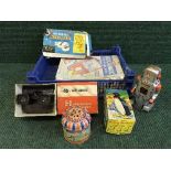 A box of mid twentieth century tin plate walking penguin and robot, play-value microscope,