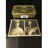 A First World War Princess Mary Christmas tin, containing one of the original cigarettes,