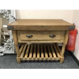 A reclaimed pine butchers block fitted a drawer