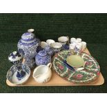 A tray of oriental china including wall plates, sake cups, lidded ginger jars,