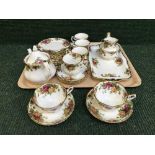 A tray of twenty four pieces of Royal Albert old country roses tea china