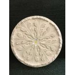A plaster ceiling rose