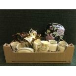 A box and basket of Royal Doulton Lambeth ware dinner service, copper lustre vases, tea cup planter,