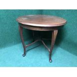 An early twentieth century mahogany circular occasional table
