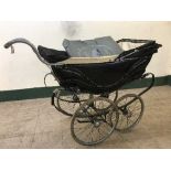 A mid twentieth century silver cross full suspension pram with canopy and extra boxed Morlands