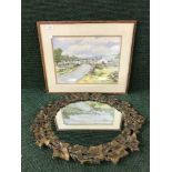 An oak framed watercolour by Reg Baxter dated 1989 depicting a rural village together with a