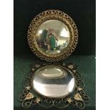 A circular gilt framed porthole mirror together with a brass framed mirror