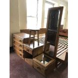A pine four drawer chest together with matching bedside stand, cheval mirror,