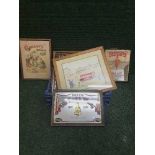 A box of seven framed pictures including Cadbury's and Jacobs advertising,