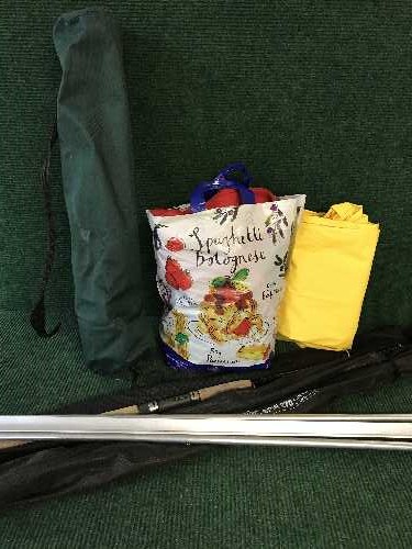 Two spinning rods together with a rod stand, folding chair and Fishing Jacket,