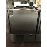 A Foster's stainless steel fridge