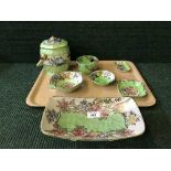 A tray of seven pieces of Maling pottery including Springtime waved green biscuit barrel ,