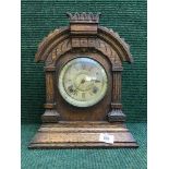 An oak late nineteenth century American mantle clock by Ansonia Clock company New York