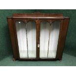 A mahogany Queen Anne style double door display cabinet