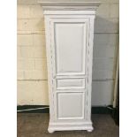 A contemporary white country corner sentry door wardrobe