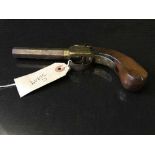 A nineteenth century percussion pistol