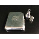 A silver cigarette case together with a silver thimble and bell