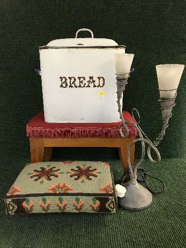 Two upholstered footstools, an enamel bread bin,