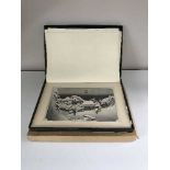 A Hioshiga Later Days portfolio of twelve prints in a clam shell box with a Chinese design folio