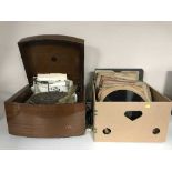 A mid twentieth century mahogany cased Pye 'Black Box' record player together with a box of