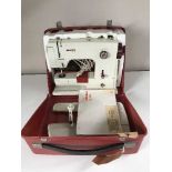 A cased Berina Minimatic sewing machine