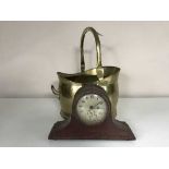 A brass coal bucket together with an early twentieth century mahogany mantle clock