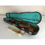 A Lark half size violin and bow in carry case