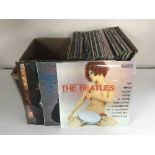 A box of LP records - musicals, Eric Clapton,