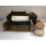 A box of seven assorted wooden book troughs