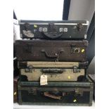 Four mid 20th century luggage cases