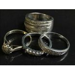 Four various 9ct gold rings, all set with diamonds, gross weight 13.