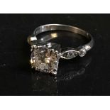 A large antique solitaire diamond ring in platinum, the central stone approximately 1.7 ct.