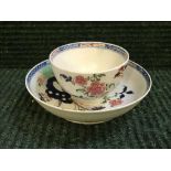 A late eighteenth century Lowestoft china teabowl and saucer, Redgrave pattern,