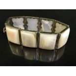 A silver and mother of pearl panel bracelet