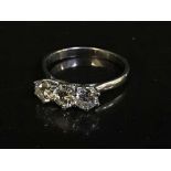 An 18ct white gold diamond three stone ring, approximately 1.5ct.